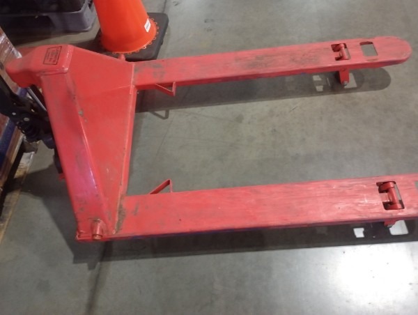 https://ct-prod-container-files.controltower.tech/prod/containers/2026/03/D6C0HY66GX-2/6479d4c2-182f-454f-8fd4-98ebe59a4143/pallet jack red 2.jpg